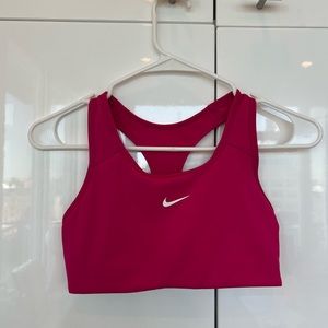 Nike dri-fit sports bra in magenta - size S